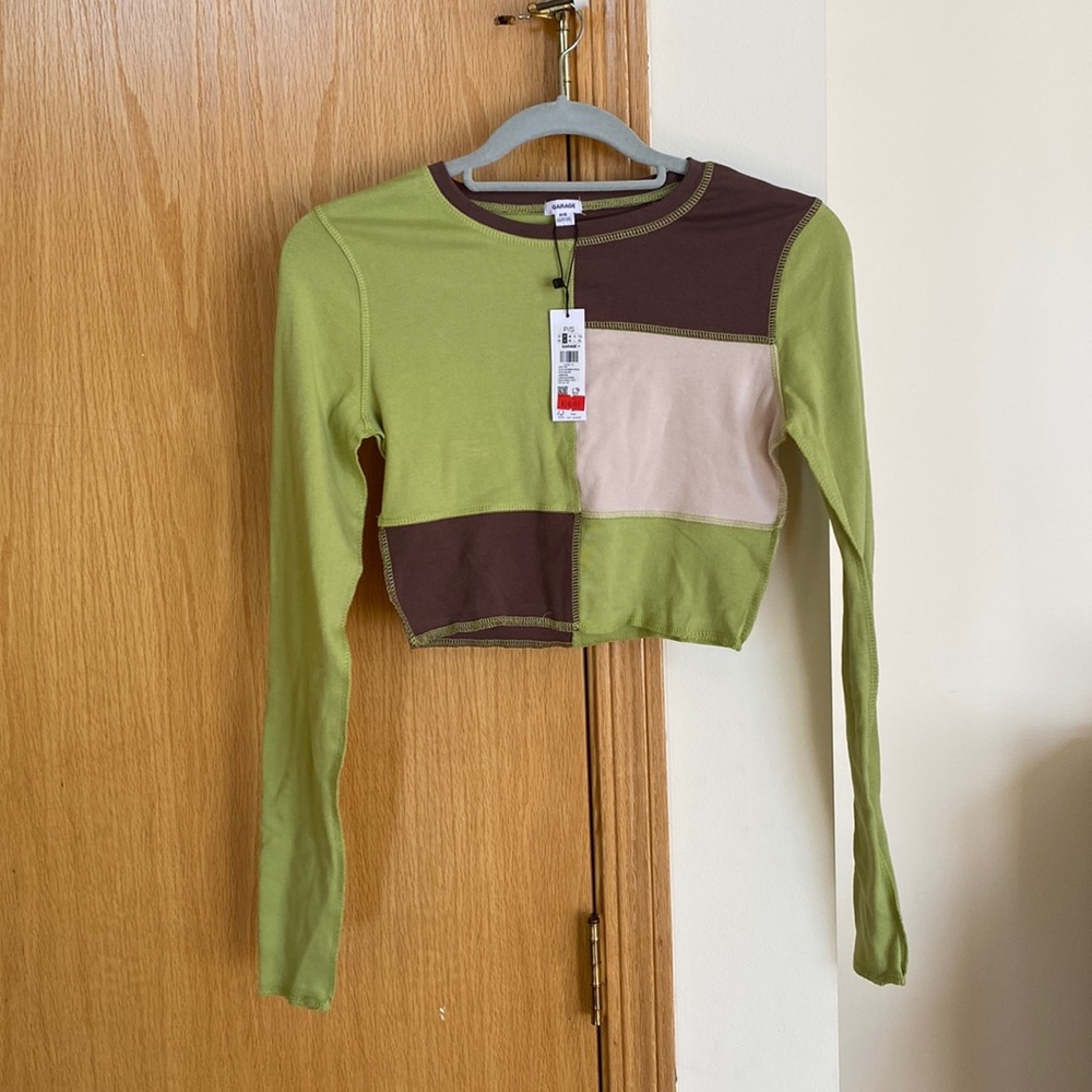 Multi-colored long sleeve crop top.